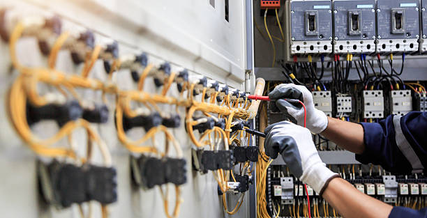 Professional Electrician technician working in Rawls Springs, MS